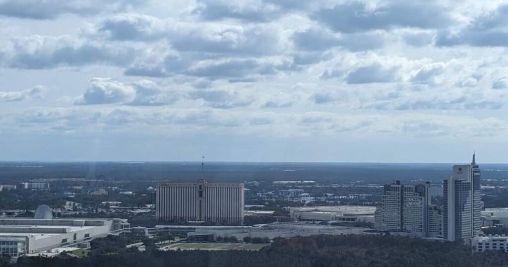 orlando skyline with clouds and a blue sky and looking down on 2 buildings